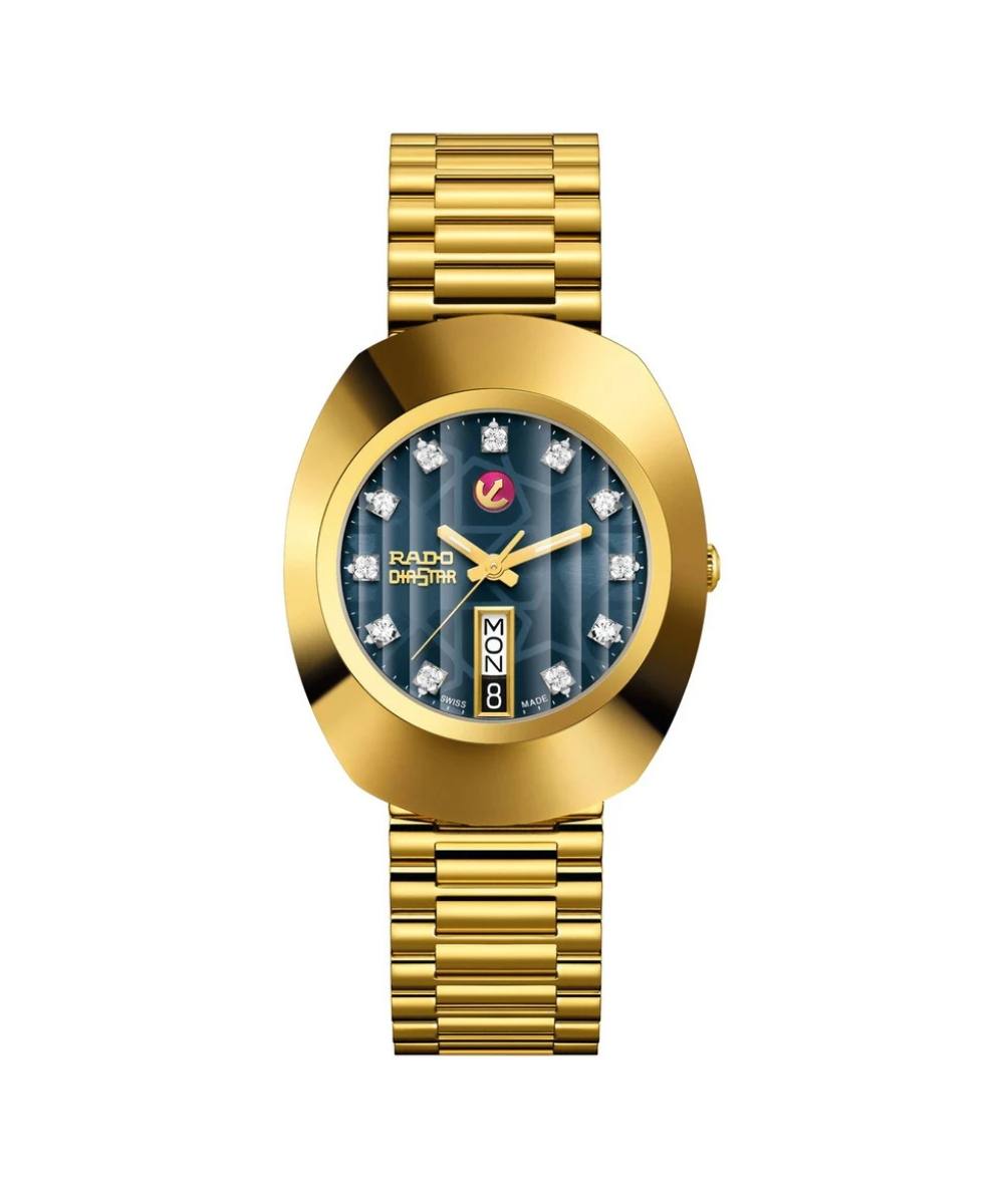 Gold wristwatch with a blue face and diamond accents on a white background