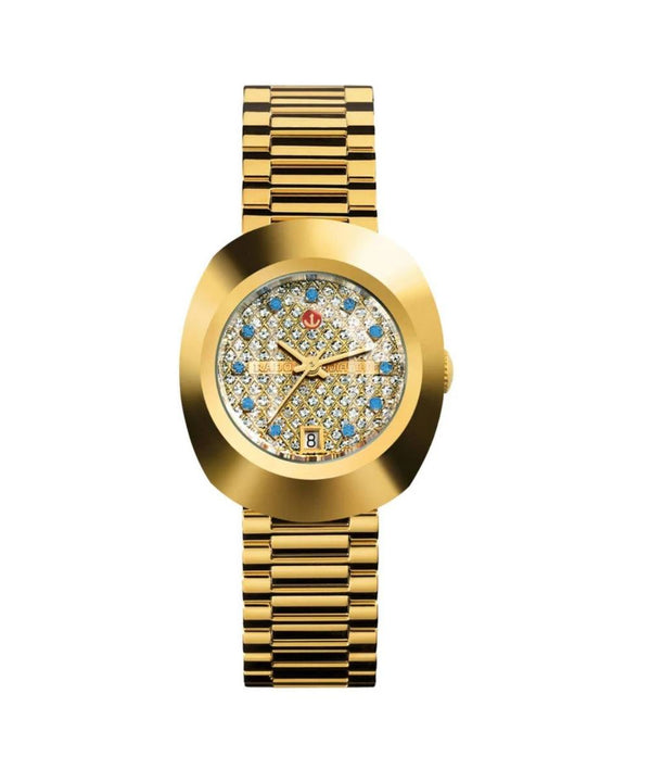 Gold wristwatch with a decorative face on a white background