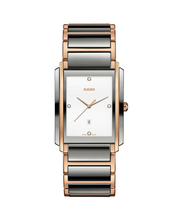 Rado watch with rose gold and silver band on a white background