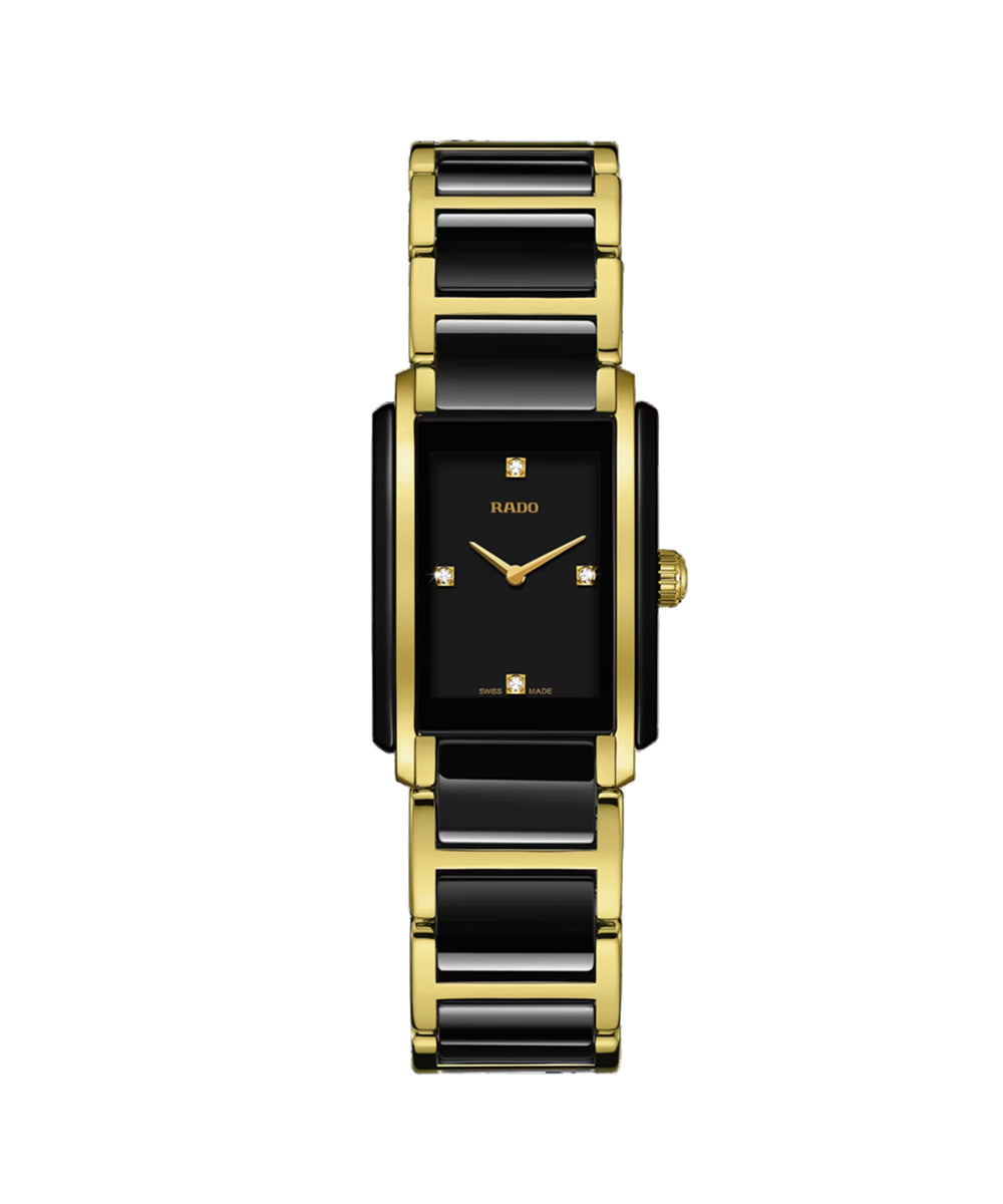 Watch with black and gold band on a white background