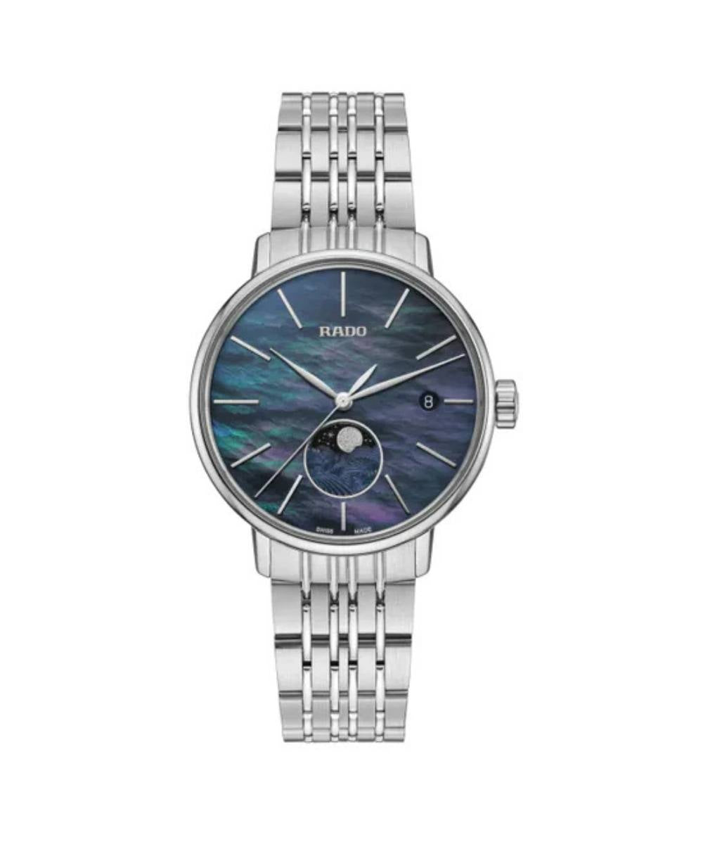 Silver Rado watch with a blue face on a white background