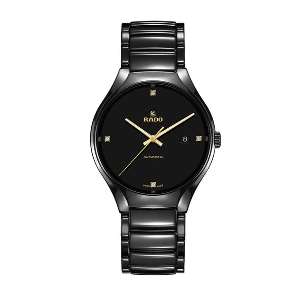 Black Rado watch with gold accents on a white background