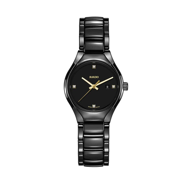 Black Rado watch with gold accents on a white background