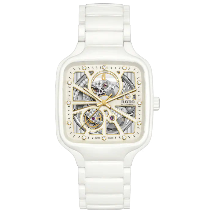 White Rado watch with a transparent face on a white background