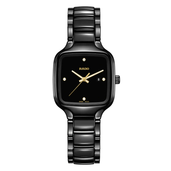 Black Rado watch with gold accents on a white background