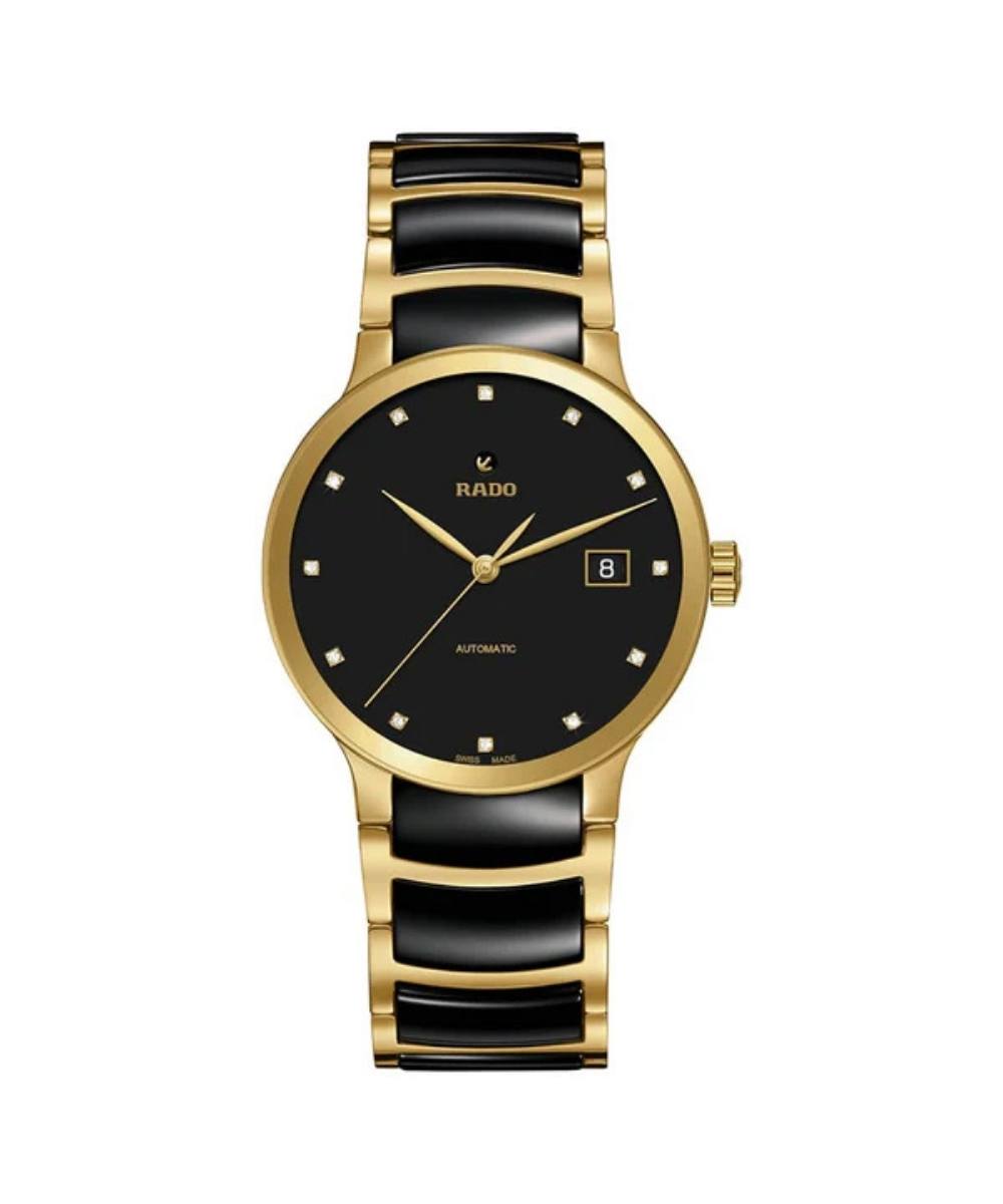 Gold and black watch with Rado brand on a white background