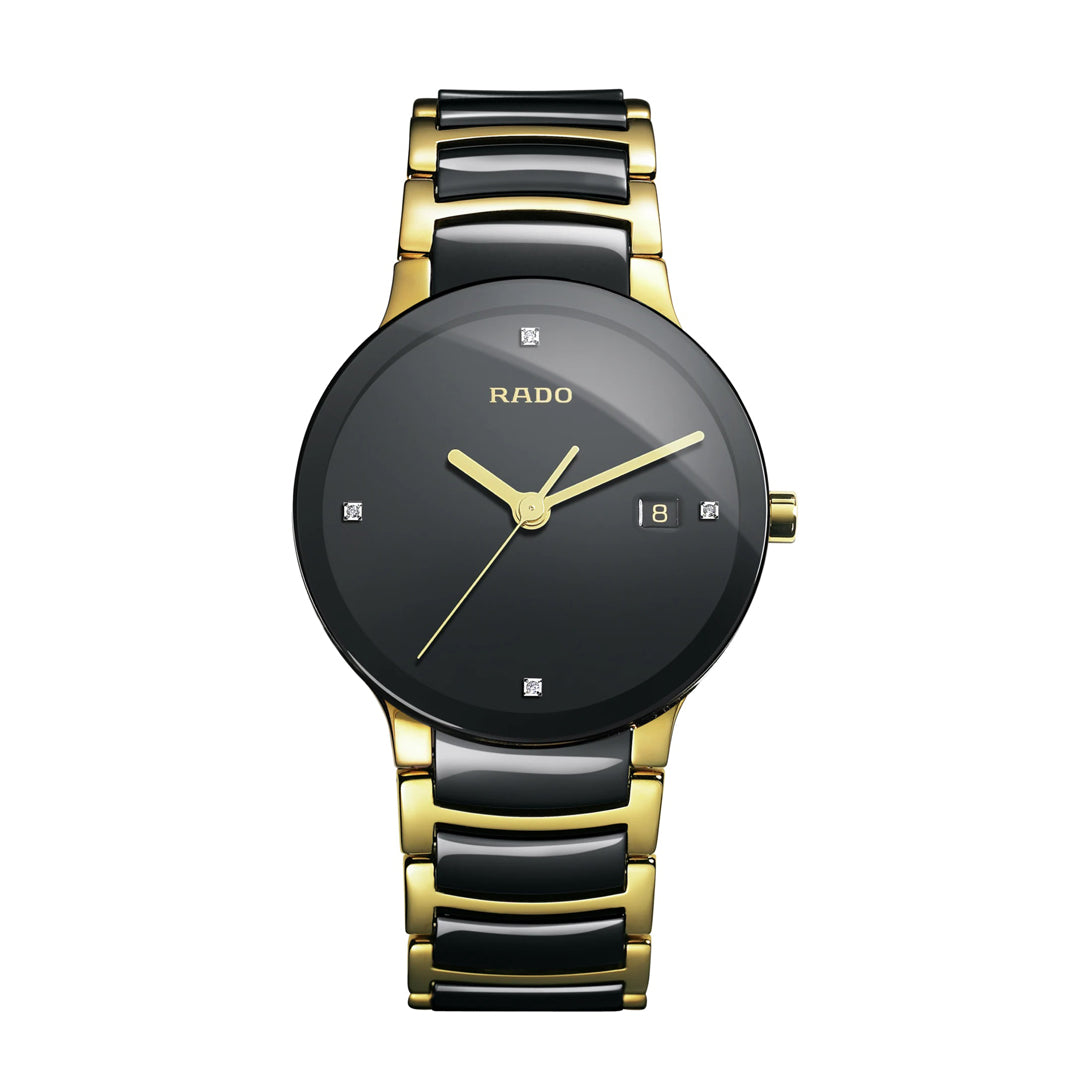 Rado watch with black and gold band on a white background