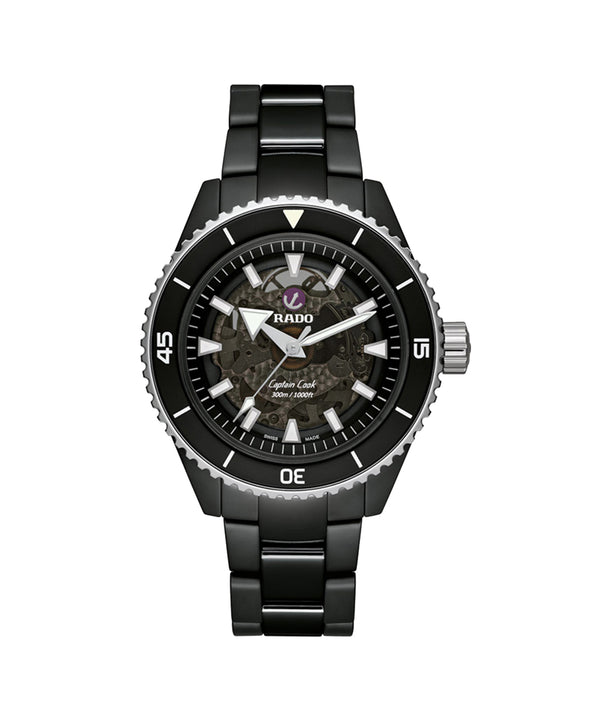 Black wristwatch with detailed face on a white background