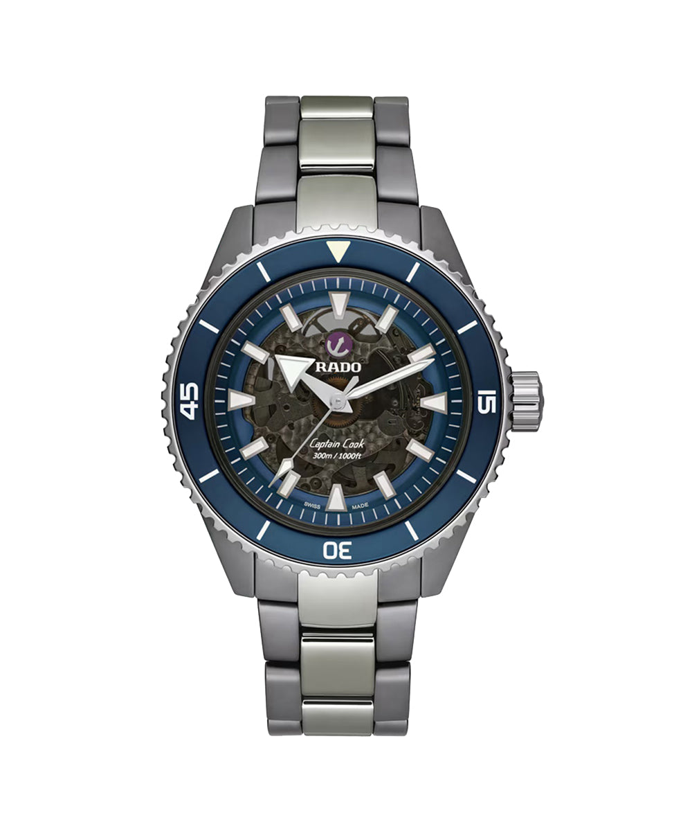 Silver watch with blue accents on a white background
