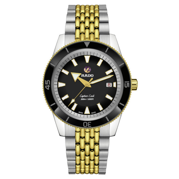 Rado watch with black face, gold and silver band on white background