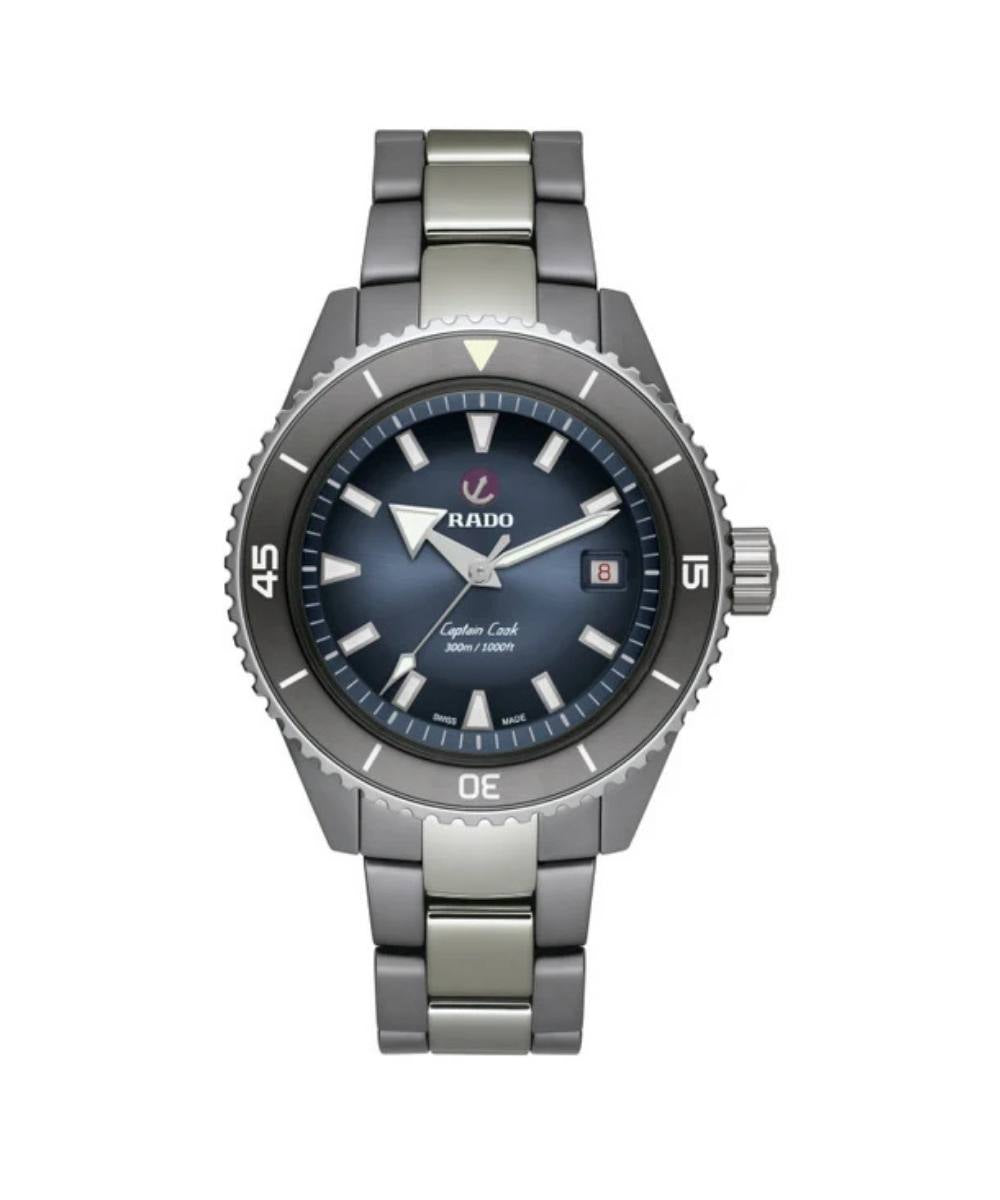 Silver watch with a blue dial on a white background