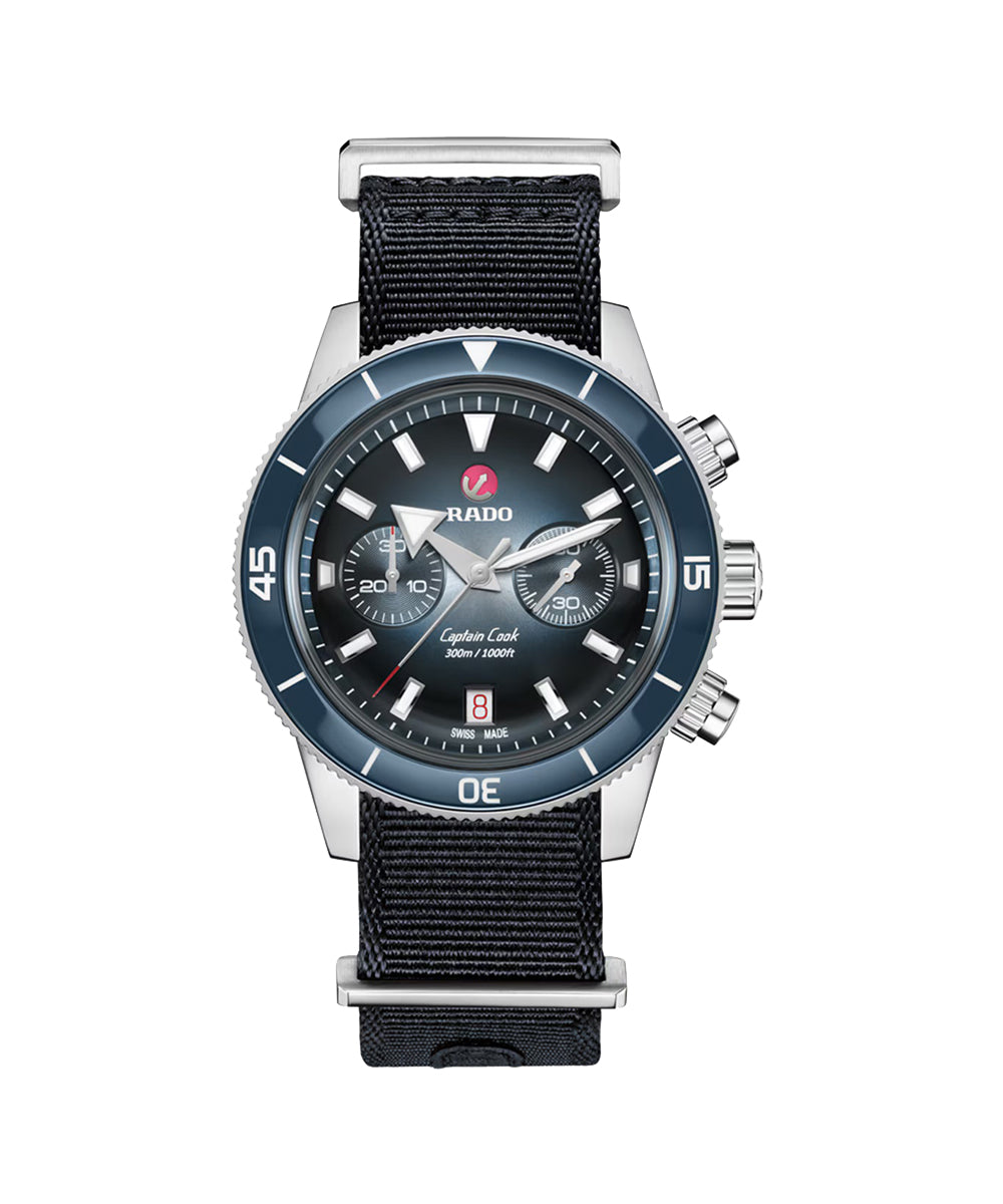 Rado watch with black strap and blue bezel on a white background