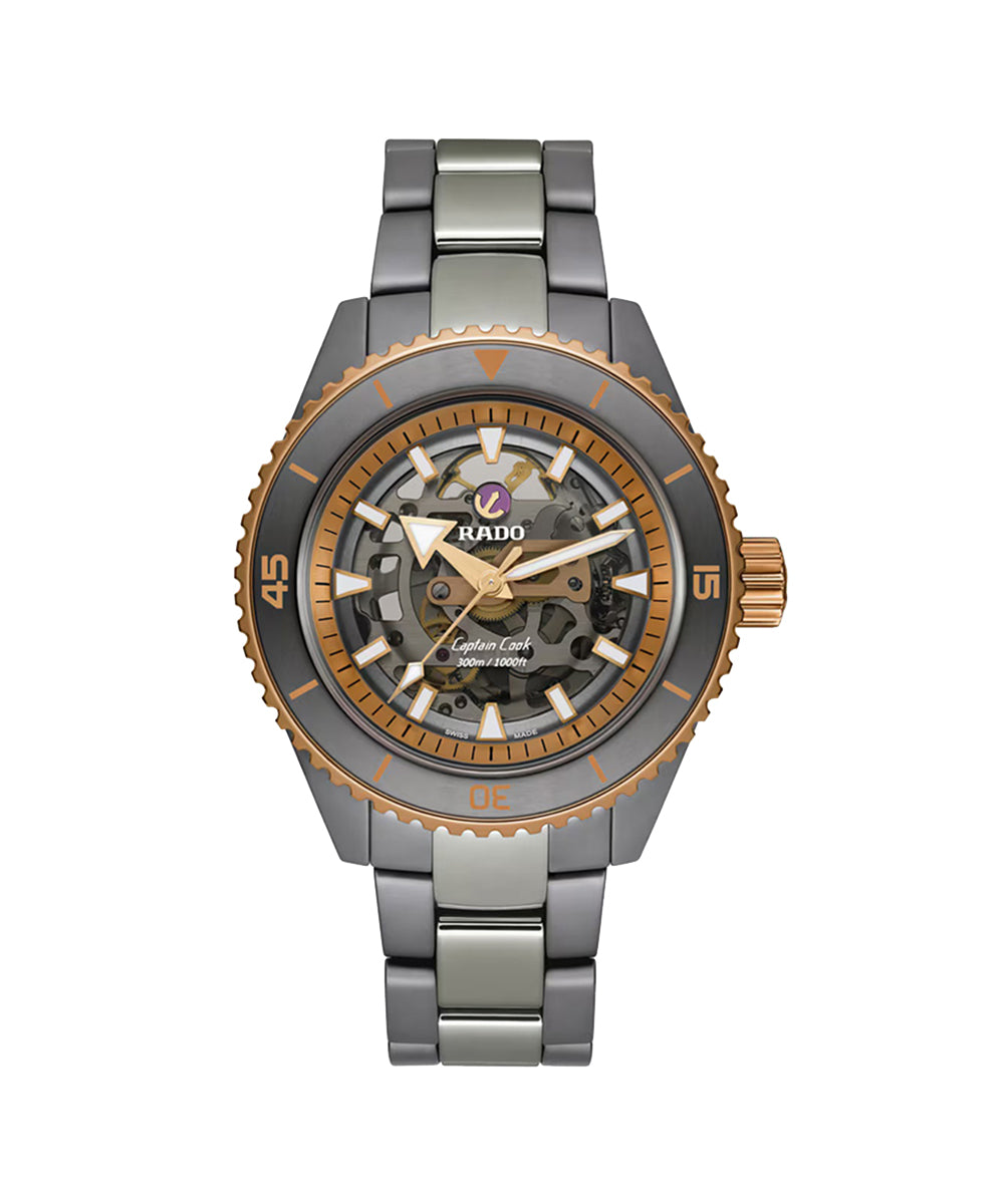 Watch with metallic band and detailed face on a white background