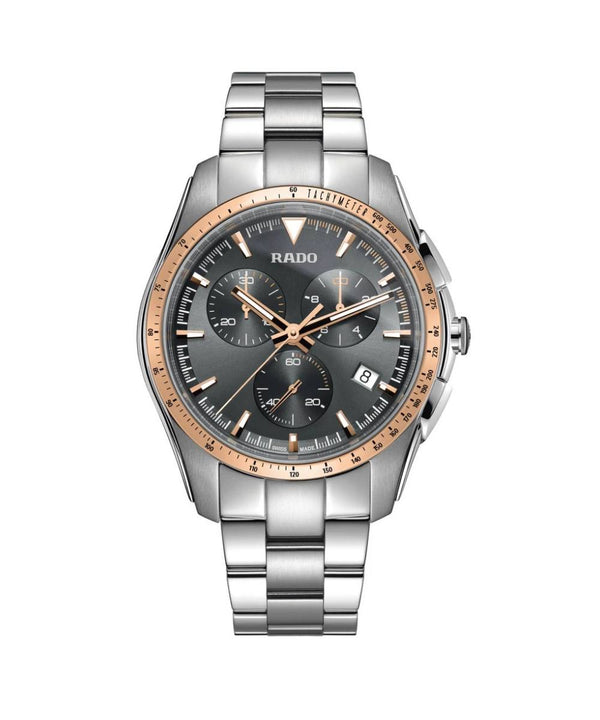Silver and rose gold Rado watch on a white background