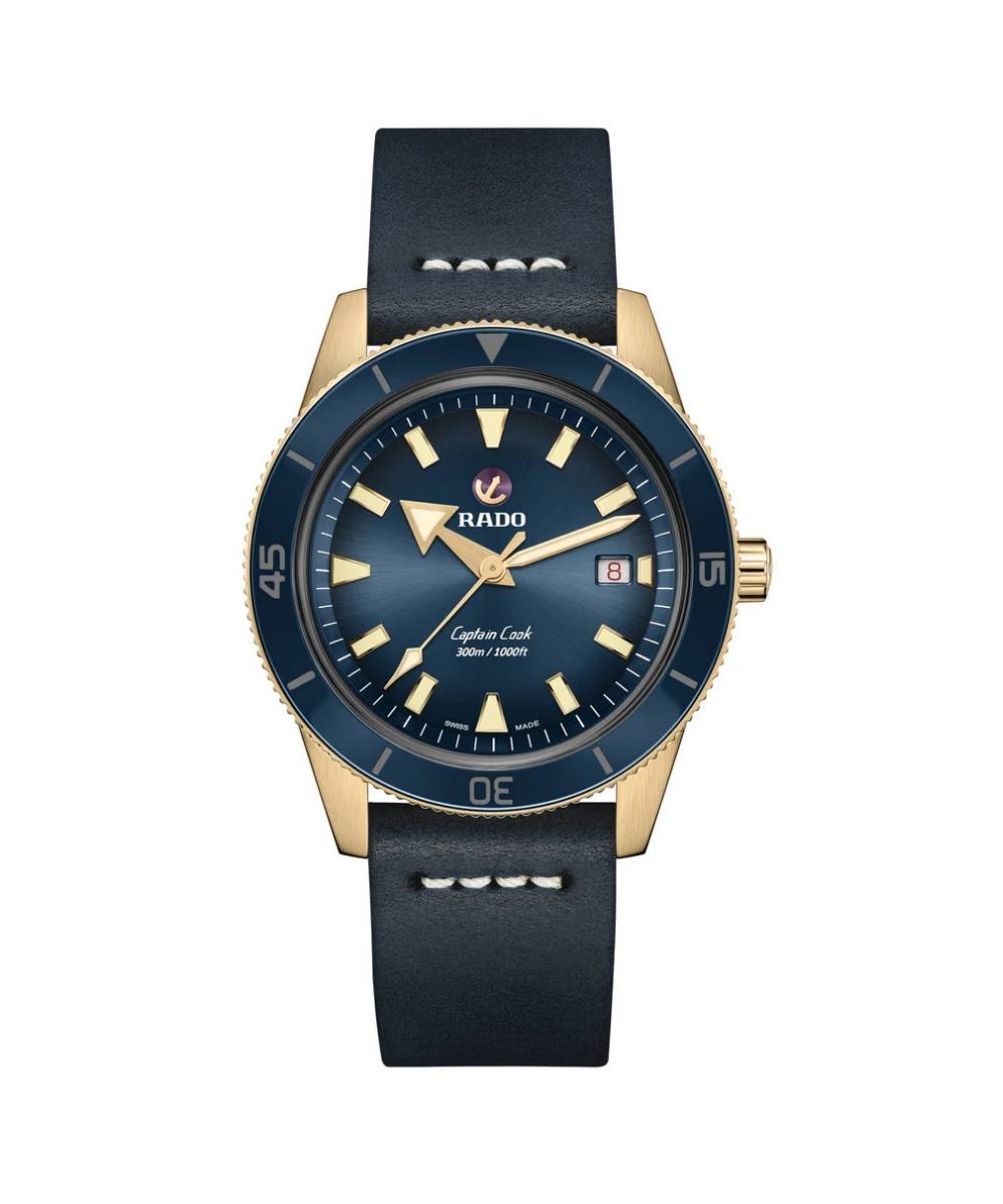 Watch with blue face and black strap on a white background