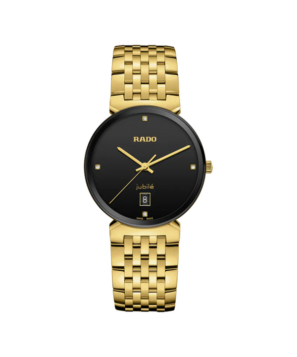 Gold watch with black face on a white background