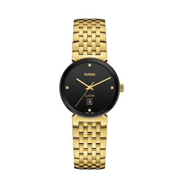 Gold watch with black face on a white background
