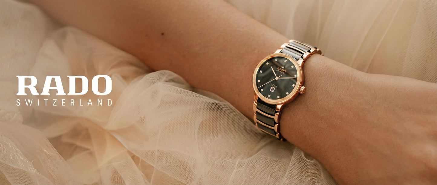 Rado watch on a wrist with a soft beige background