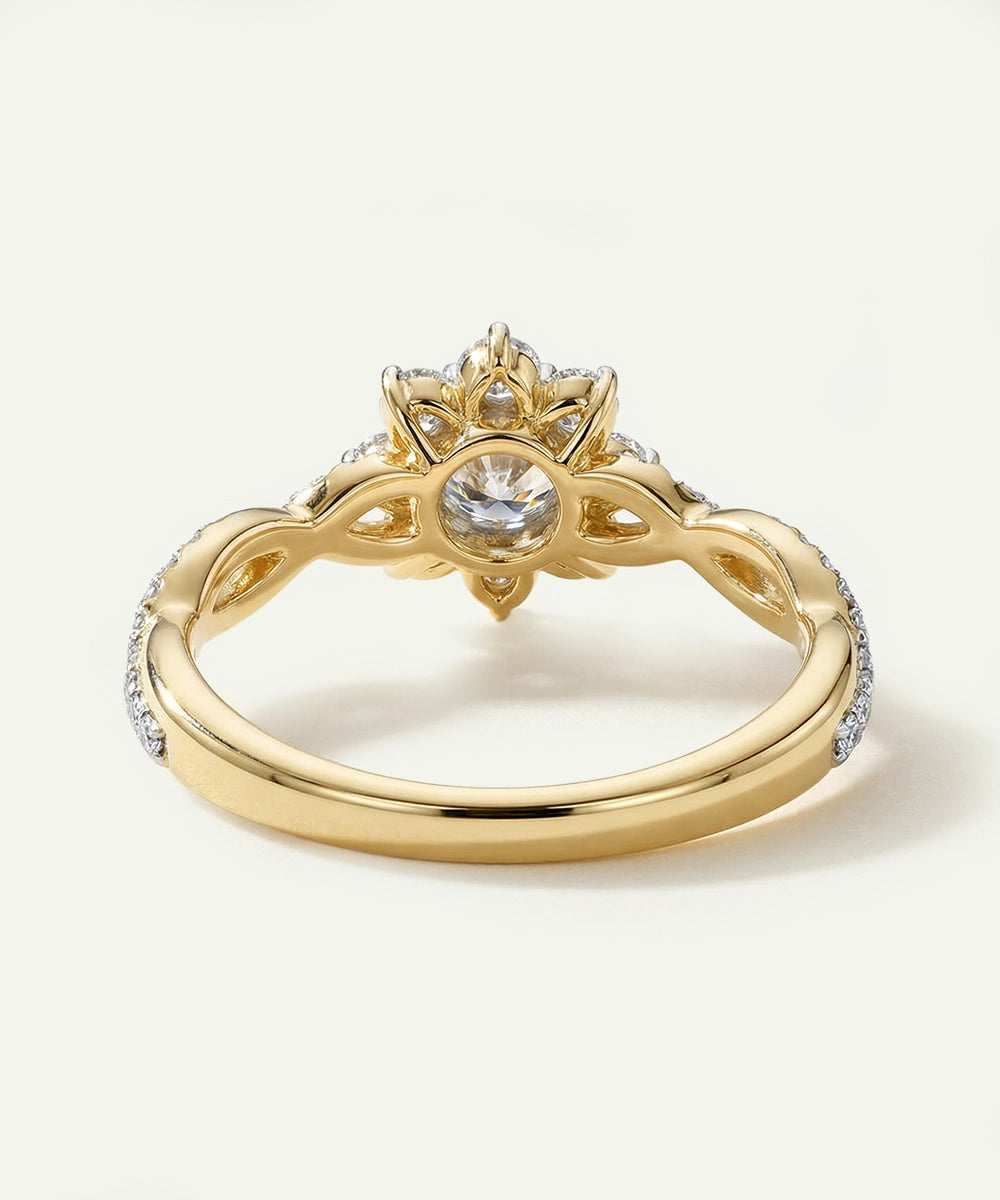 Gold ring with a diamond on a white background