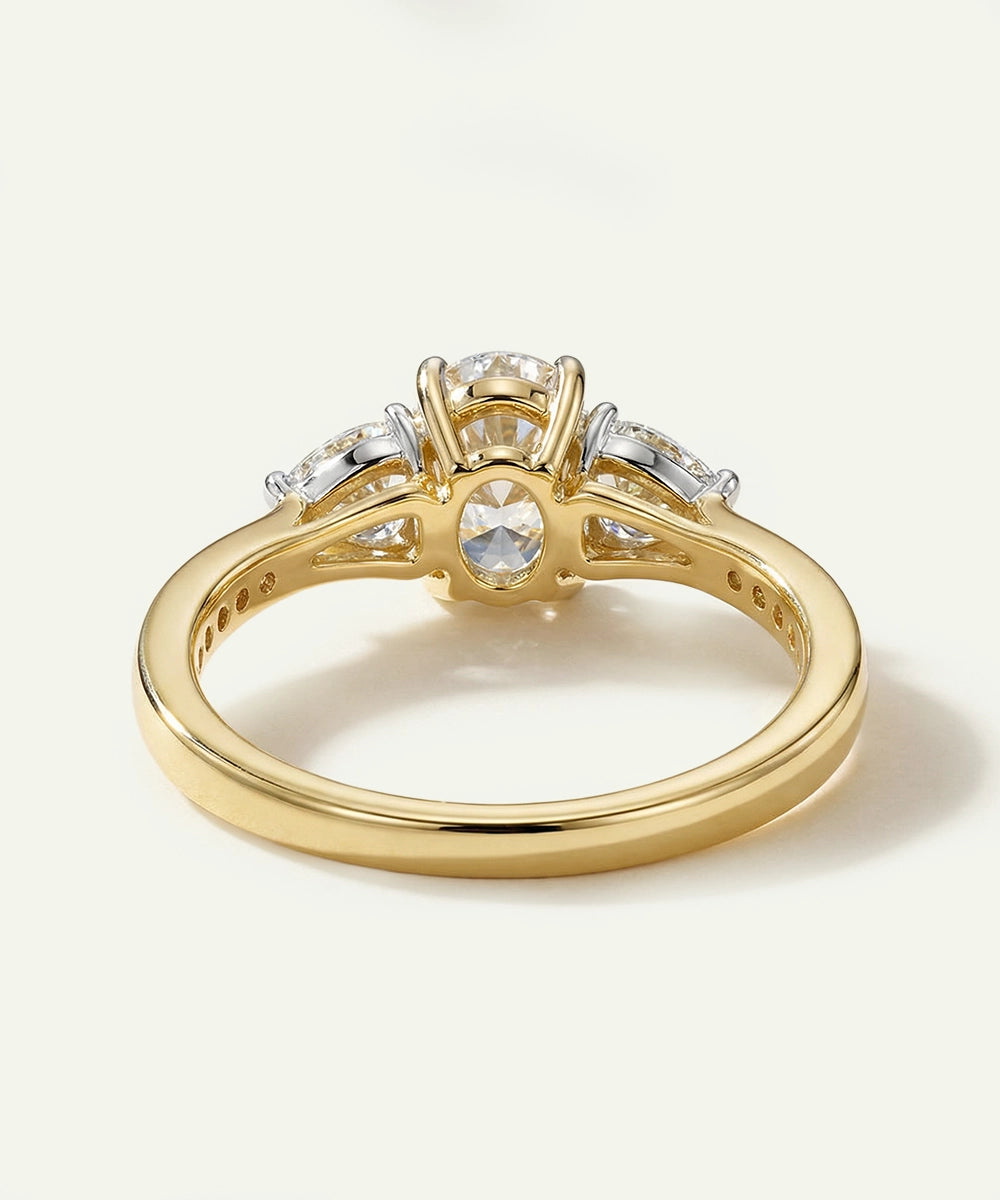 Gold ring with diamonds on a light background