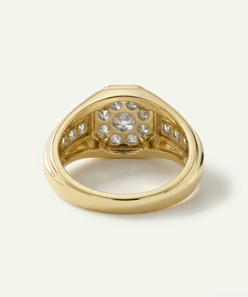 Gold ring with diamond accents on a white background