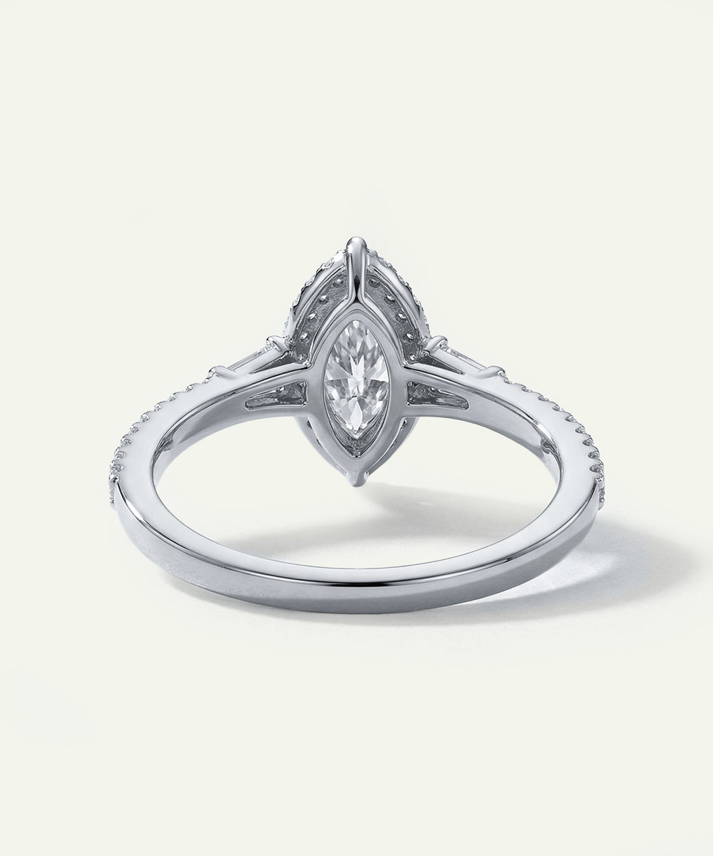 Silver ring with a diamond on a white background