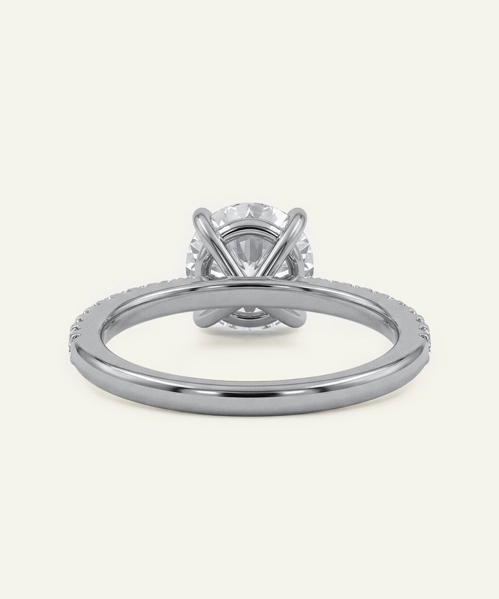 Silver ring with a diamond on a white background