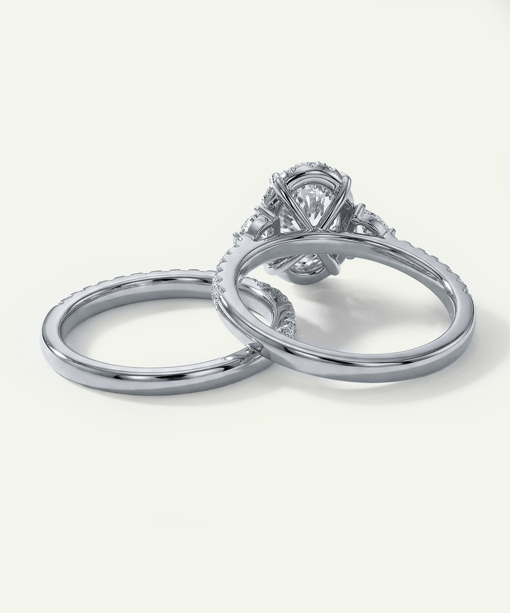 Two silver rings with diamond accents on a white background