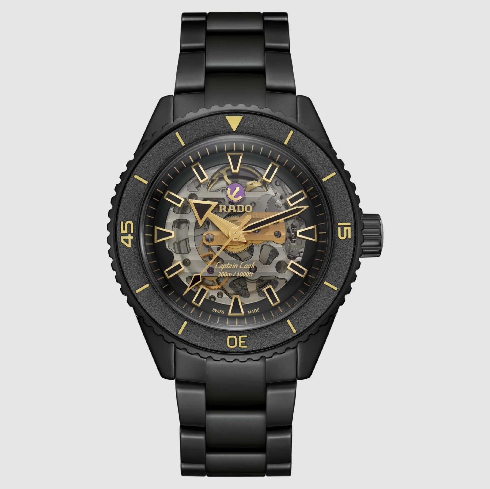 Black Rado watch with gold accents on a white background