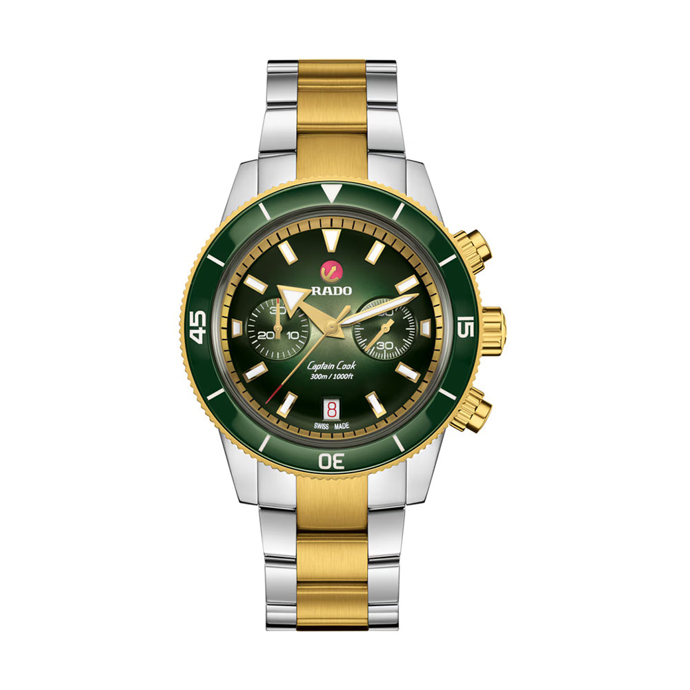 Rado watch with green face and gold and silver band on white background