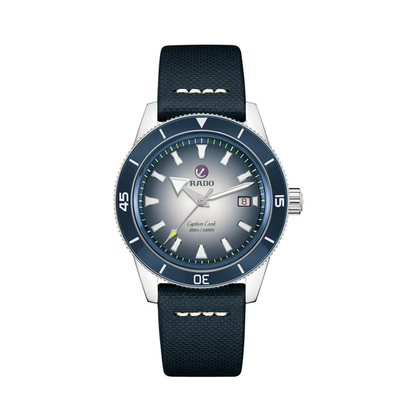 Watch with blue strap and silver case on a white background