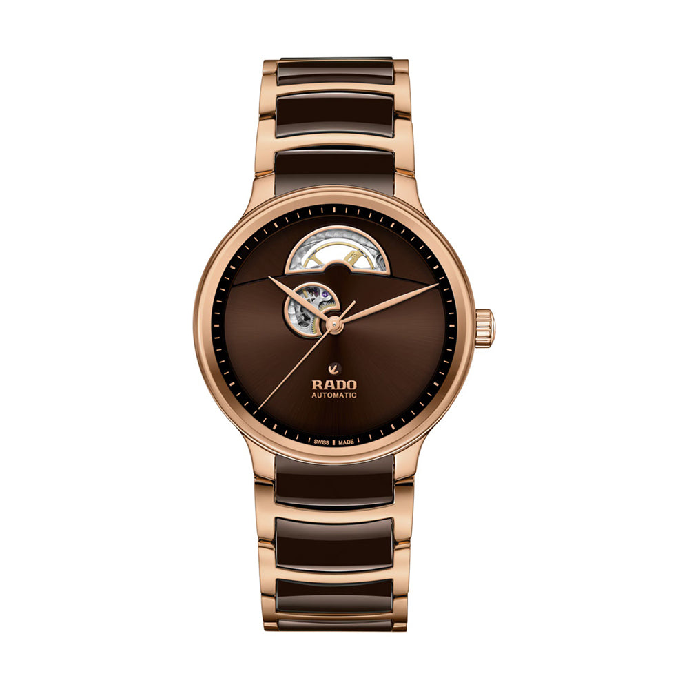 Brown and rose gold watch with Rado logo on a white background