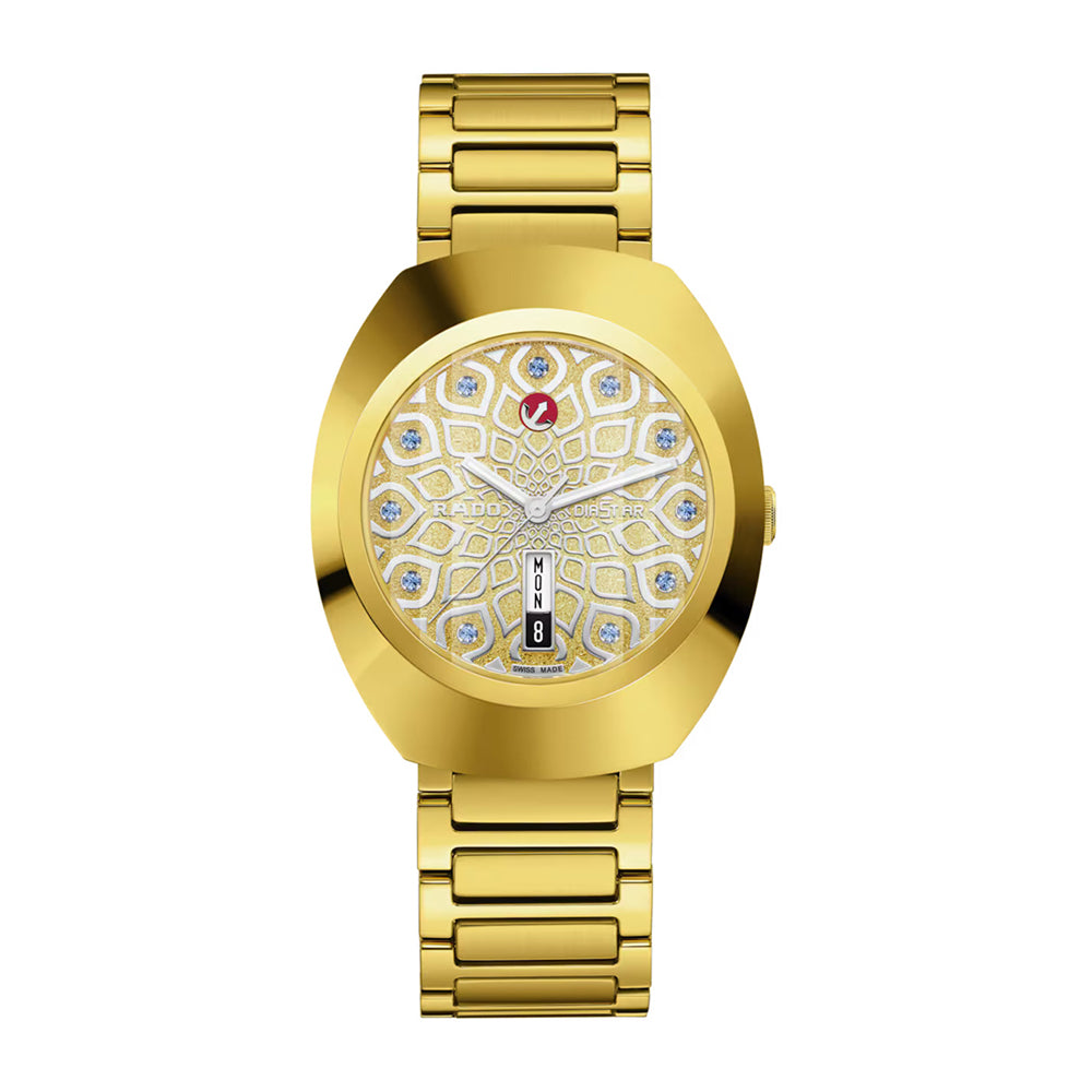 Gold wristwatch with intricate design on a white background