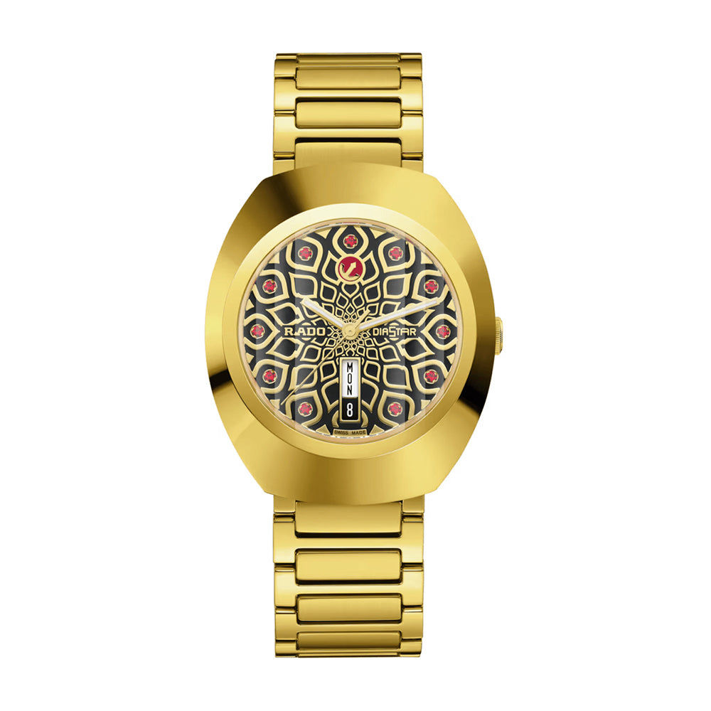 Gold wristwatch with a detailed face on a white background