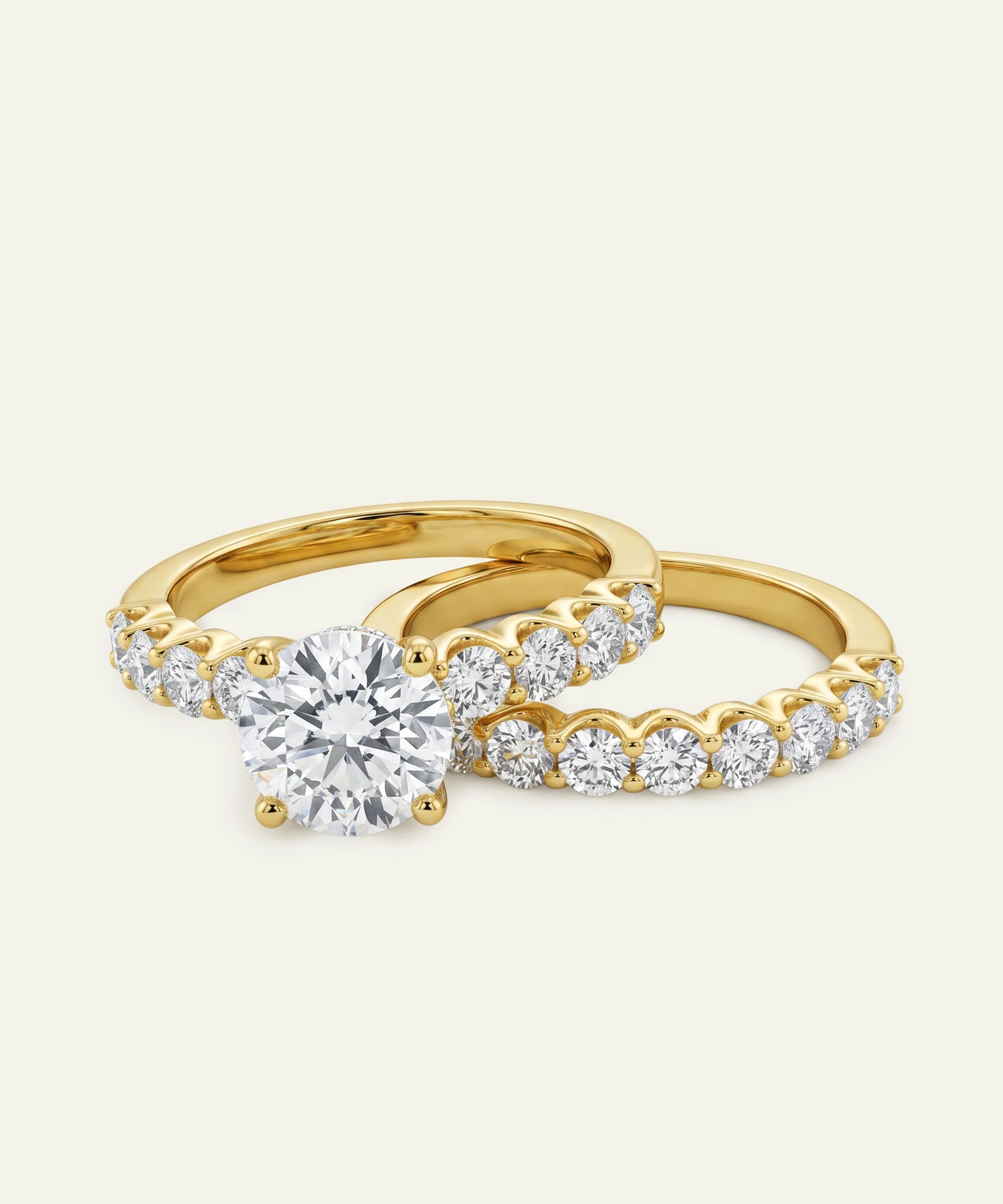 Gold ring with diamond on a white background