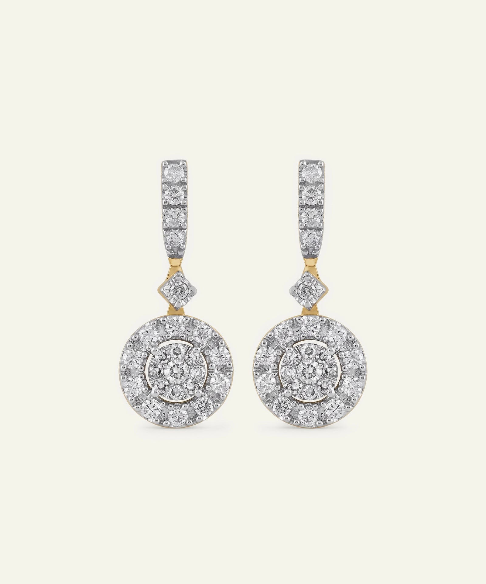 Pair of diamond earrings on a white background
