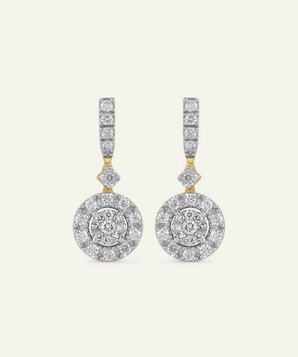 Pair of diamond earrings on a white background