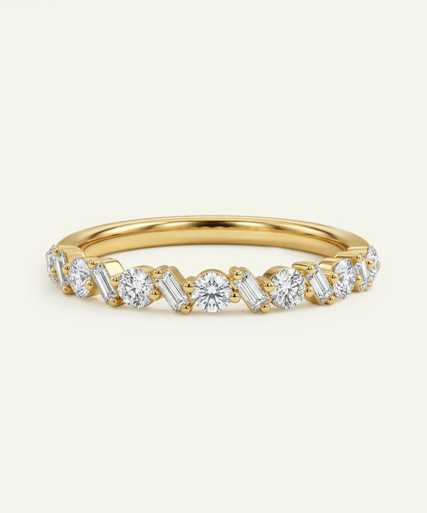 Gold ring with diamonds on a white background
