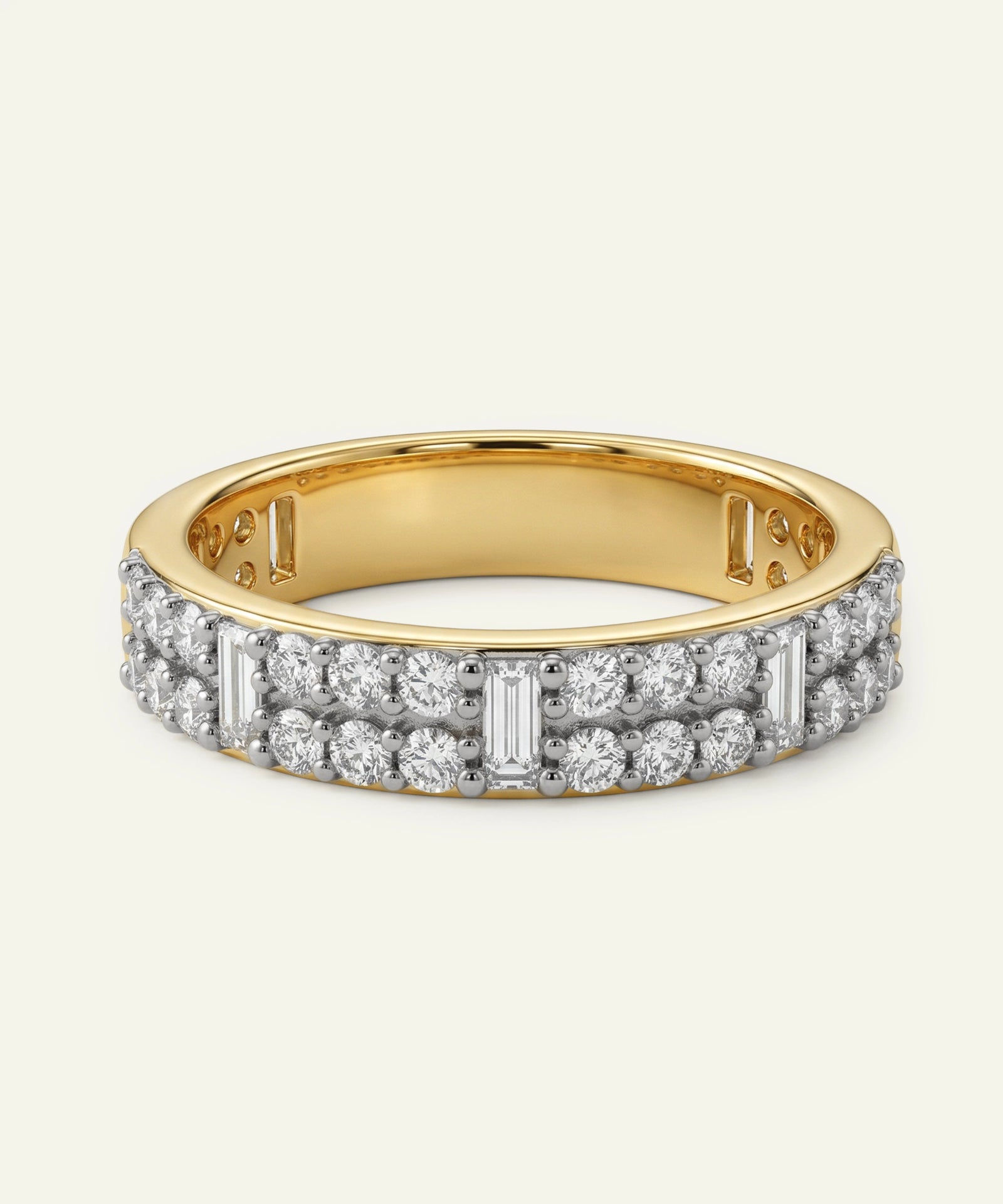 Gold ring with diamond accents on a white background