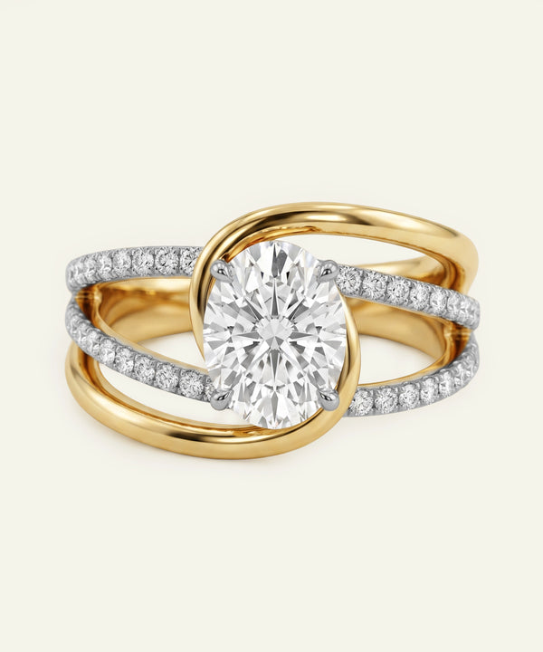 Gold and diamond ring on a white background