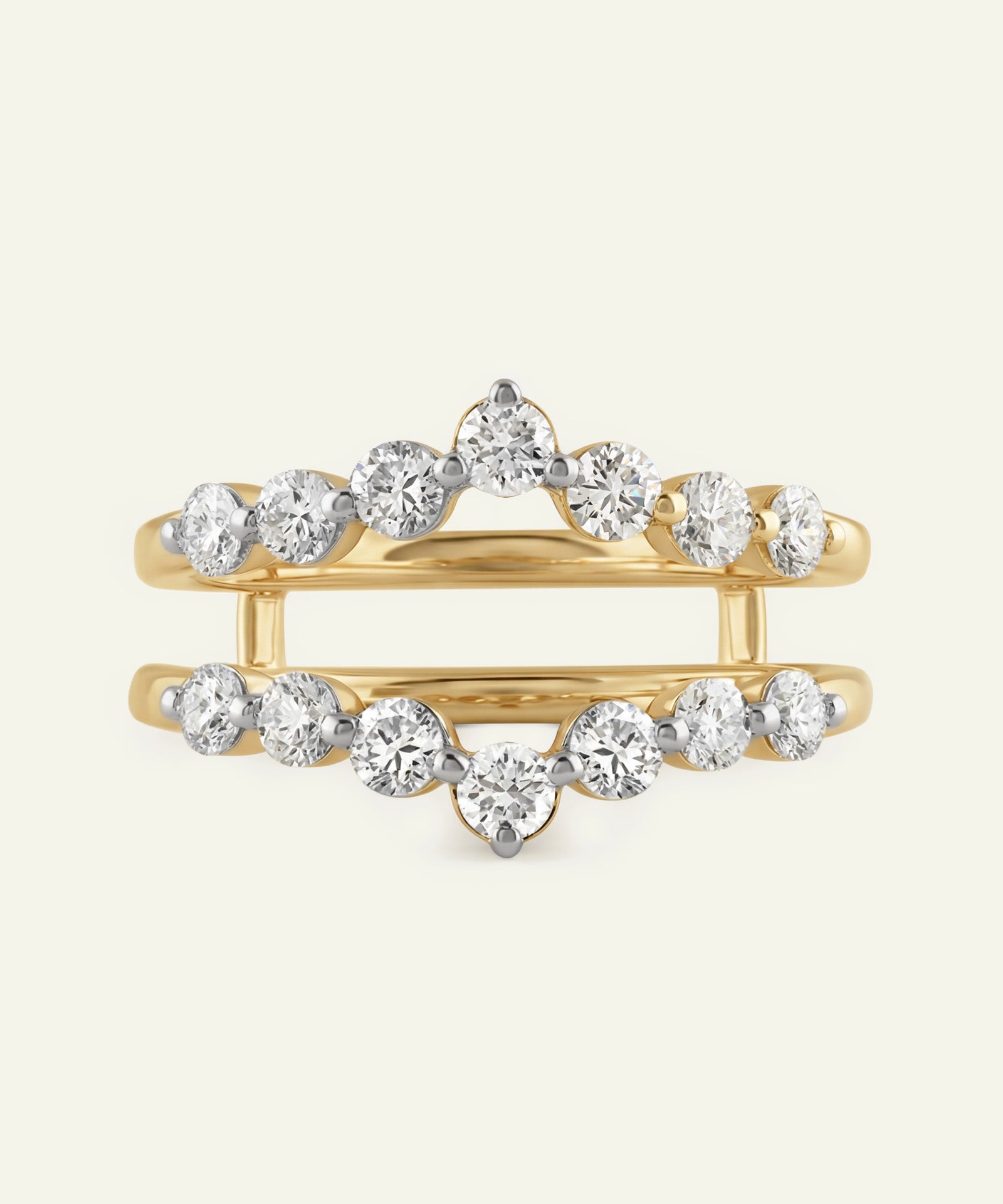 Gold ring with diamond stones on a white background