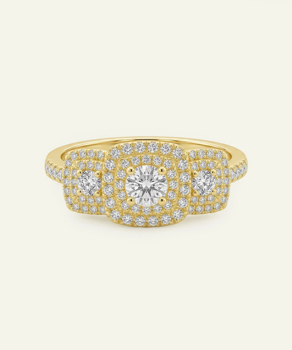 Gold ring with diamonds on a white background