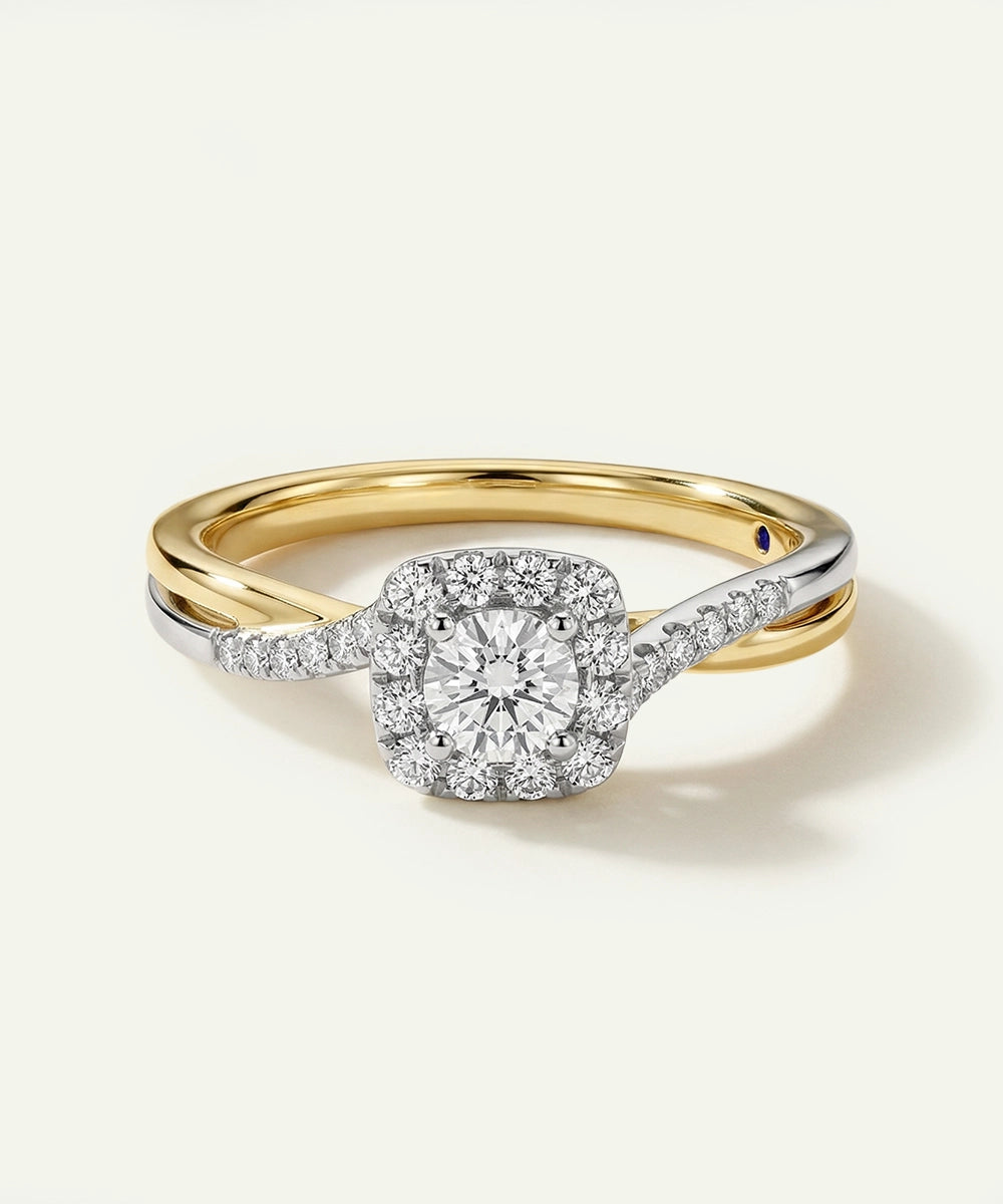 Gold and diamond ring on a light background