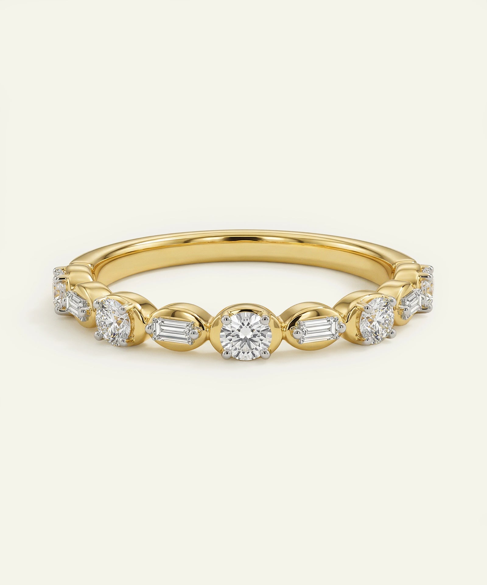 Gold ring with diamonds on a white background