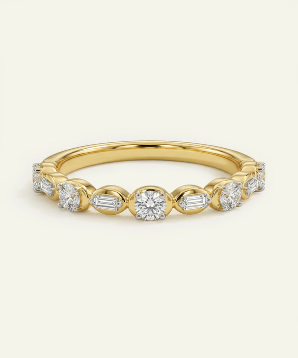 Gold ring with diamonds on a white background