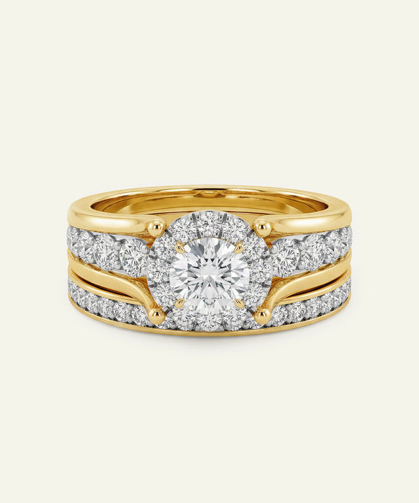Gold ring with a diamond on a white background
