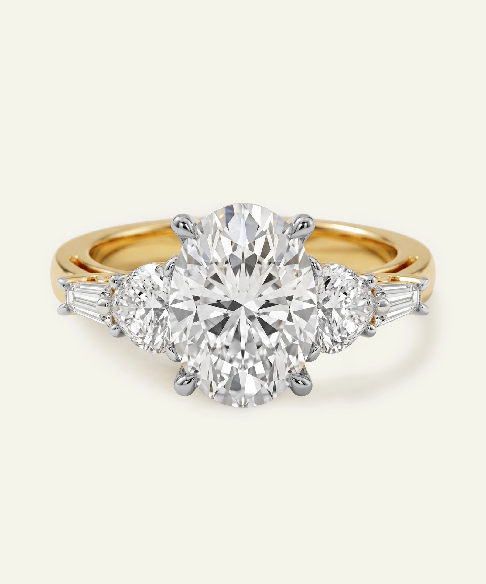 Gold ring with a large diamond and smaller diamonds on the sides against a white background