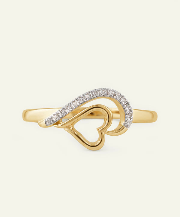 Gold ring with heart design and diamond accents on a white background