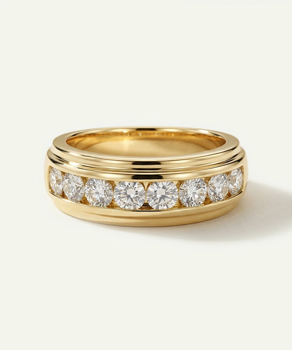 Gold ring with diamonds on a white background