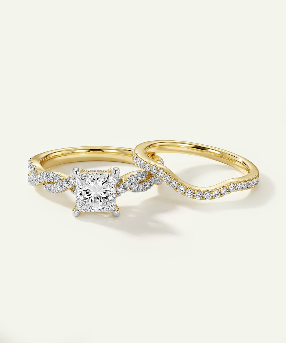 Gold ring with diamond on a white background